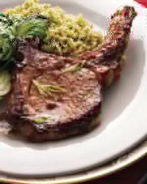 Martha Stewart soy-and-ginger-marinated pork chops with glossy brown sugar glaze on a plate