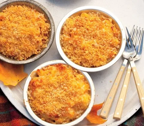 Three-cheese macaroni with golden panko breadcrumb topping in a baking dish