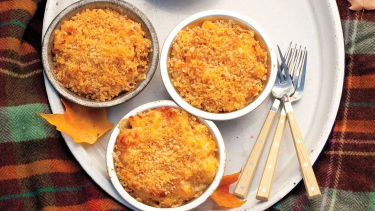 Three-cheese macaroni with golden panko breadcrumb topping in a baking dish