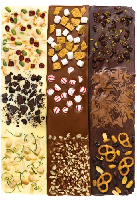 Martha Stewart basic bark in white, milk and dark chocolate topped with pistachios, cranberries, marshmallows, peppermint candies and pretzels
