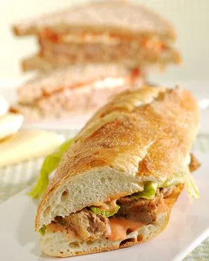 Martha Stewart best turkey meatloaf sandwich on a crusty baguette with lettuce and ketchup spread