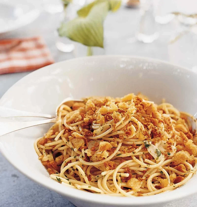 Martha Stewart bottarga pasta with golden breadcrumbs and parsley in a white bowl